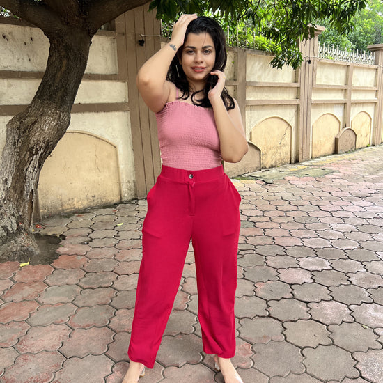 Discover elegance in our High Rise Peach Textured Bootcut Trousers. These ankle-length trousers feature a high rise, button closure, and pockets. Ideal for casual occasions, find them on Wyshlist. Elevate your wardrobe with our trendy women's bottoms.