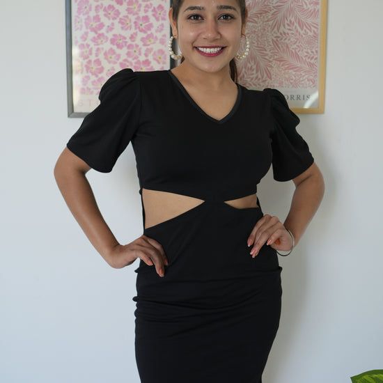 Experience the allure of Black Elegance in our Polyester Midi, perfect for Western wear. With 3/4 sleeves and a below-knee length, it's a must-have. Add to your Wyshlist today! Join influencers in setting the latest trends. 