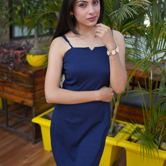 Discover chic in our SleekPoly Mini Bodycon. Perfect for casual vibes, this sleeveless dress in solid polyester is your style essential. Also, check our Black Ethnic Motifs A-line Dress for trendy elegance. Wyshlist now!