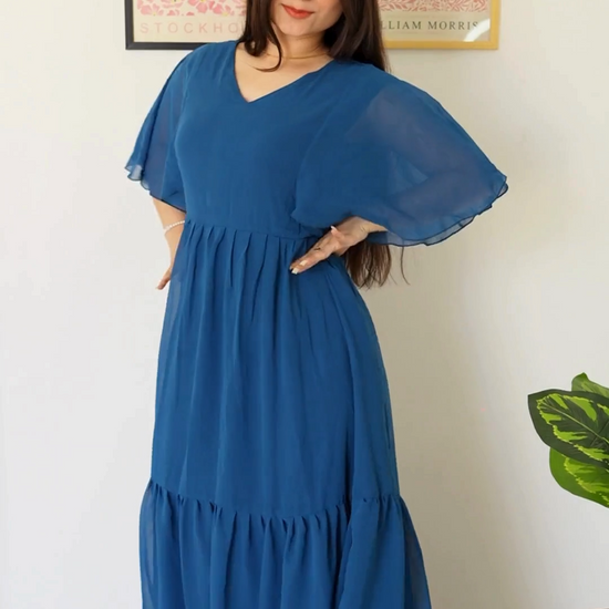 Command attention in this royal blue maxi! Flowy georgette, a flattering V-neck & chic ruffled sleeves add drama. Perfect for casual events. Influencers love our maxis! Wyshlist it today! 
