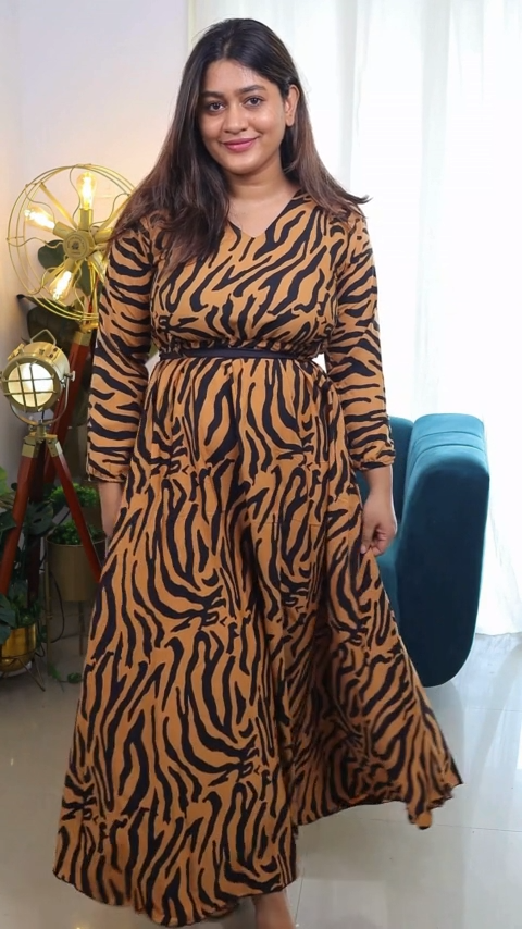 Maroon Elegance Midi Dress: Animal printed, V-neck, half sleeves, fit-and-flared hem. Casual chic with a trendy animal print. Explore Long Dress, White Maxi Dress, and more at Wyshlist. Shop online for modest and stylish maxi dress.